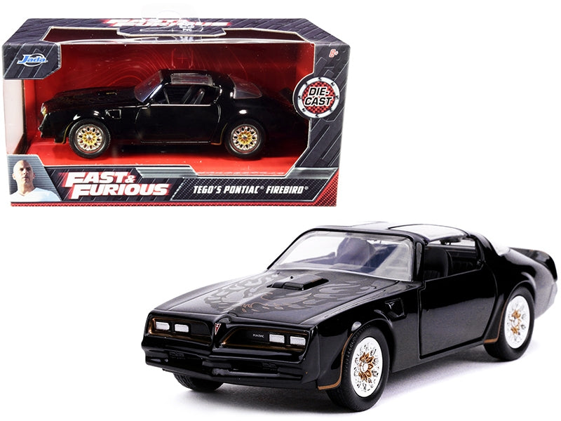 Tego's Pontiac Firebird Black with Gold Stripes and Hood Bird "Fast & Furious" Series 1/32 Diecast Model Car by Jada